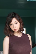 Hikaru Aoyama 青山ひかる, Shukan Jitsuwa 2020.11.19 (週刊実話 2020年11月19日号) A woman in a brown top posing for a picture.